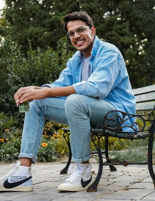 Man in a blue shirt sitting Man in a blue shirt sitting
