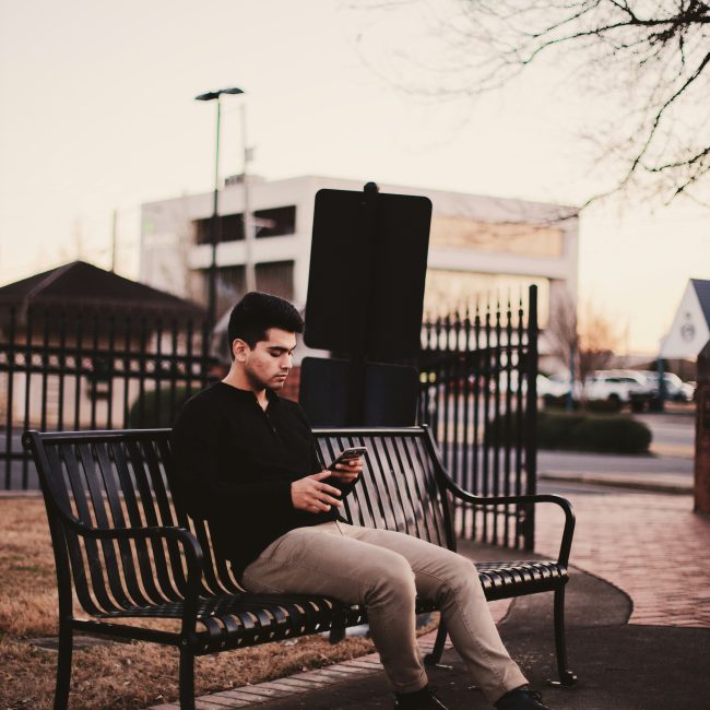 Man sitting on bench Man sitting on bench